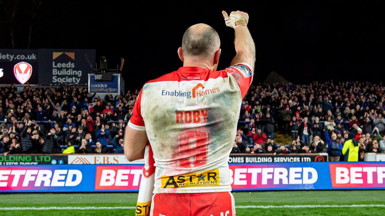 Picture by Allan McKenzie/SWpix.com - 01/04/2022 - Rugby League - Betfred Super League Round 7 - Leeds Rhinos v St Helens - Headingley Stadium, Leeds, England - St Helens&#39;s James Roby in his 500th Super League appearance goes to thank the fans after victory over Leeds.