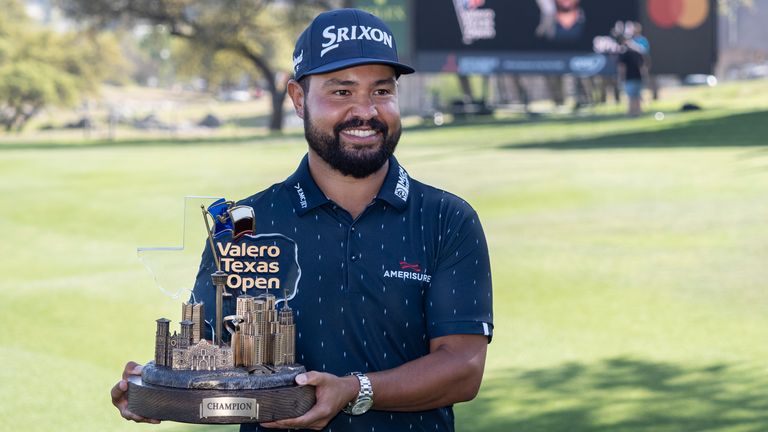 JJ Spaun holds the Valero Texas Open trophy