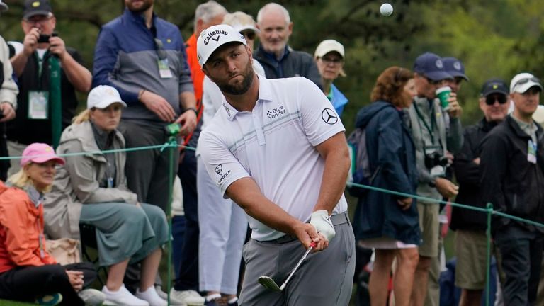 Jon Rahm, of Spain, hits on the 14th hole during a practice round for the Masters