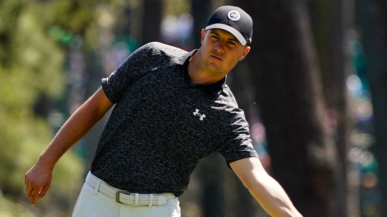 Jordan Spieth motions with his golf club on the third hole during a practice round for the Masters 