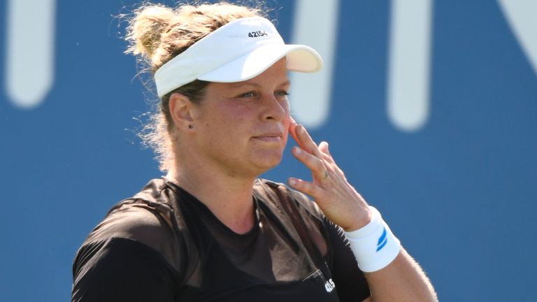 Kim Clijsters, of Belgium, misses a shot against Su-Wei Hsieh, of Taiwan during her first round match in the Chicago Fall Tennis Classic tournament, Monday,  Sept. 27, 2021, in Chicago. (AP Photo/Matt Marton)     