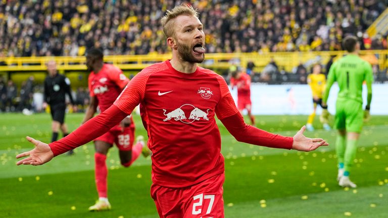 RB Leipzig's Konrad Laimer celebrates scoring his side's first goal against Dortmund.