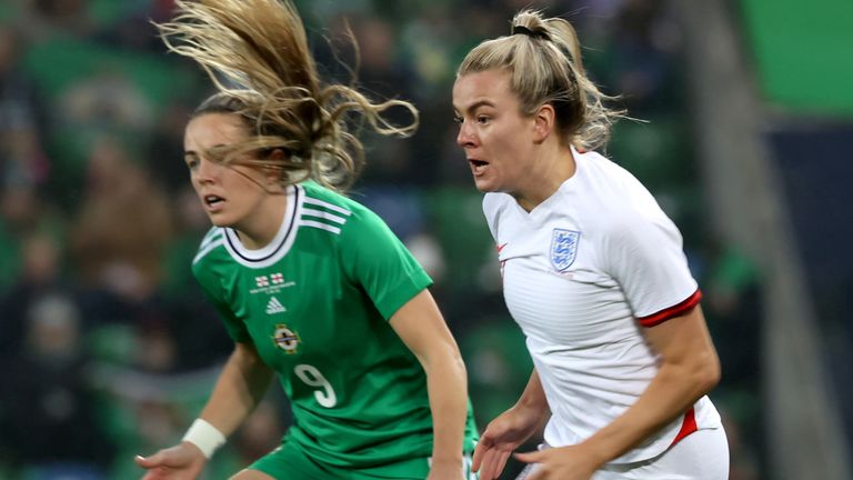 Northern Ireland&#39;s Simone Magill battles with England&#39;s Lauren Hemp during their World Cup qualifier