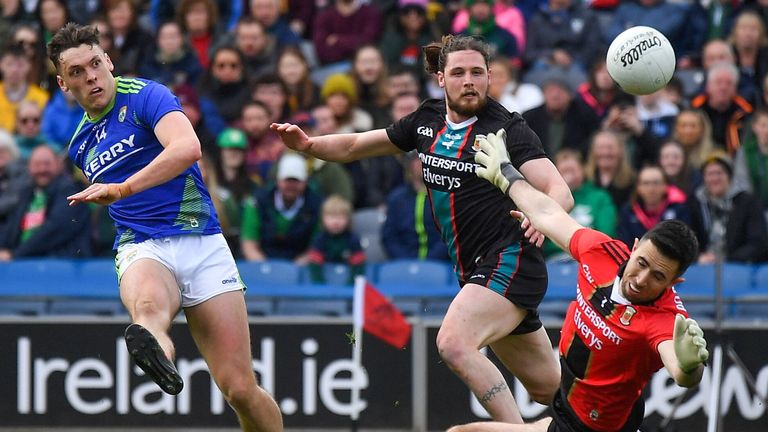 3 April 2022; David Clifford of Kerry shoots past P..draig O'Hora and Mayo goalkeeper Rory Byrne to score his side's third goal, in the 66th minute, during the Allianz Football League Division 1 Final match between Kerry and Mayo at Croke Park in Dublin. Photo by Ray McManus/Sportsfile