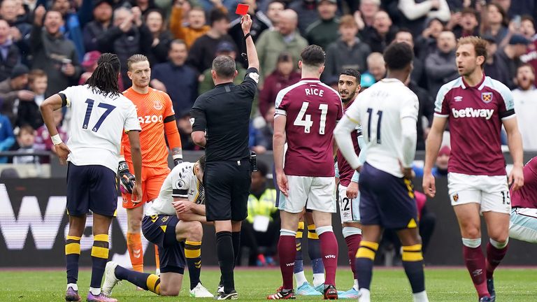 Michael Keane receives a red card for his challenge on Michail Antonio