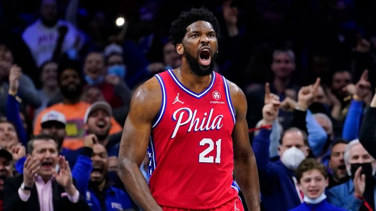 Philadelphia 76ers' Joel Embiid reacts after making a basket during the first half of Game 2 of an NBA basketball first-round playoff series against the Toronto Raptors, Monday, April 18, 2022, in Philadelphia.