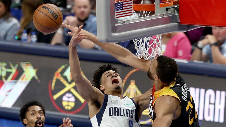 APRIL 18: Rudy Gobert #27 of the Utah Jazz blocks a shot by Josh Green #8 of the Dallas Mavericks in the first half of Game Two of the Western Conference First Round NBA Playoffs at American Airlines Center on April 18, 2022 in Dallas, Texas.