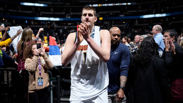 Denver Nuggets center Nikola Jokic claps as he leaves the court after the team&#39;s NBA basketball game against the Memphis Grizzlies on Thursday, April 7, 2022, in Denver. (AP Photo/David Zalubowski)