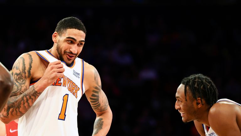 New York Knicks forward Obi Toppin (1) interacts with New York Knicks guard Immanuel Quickley (5) during the second half of an NBA basketball game against the Toronto Raptors, Sunday, April 10, 2022 in New York. 