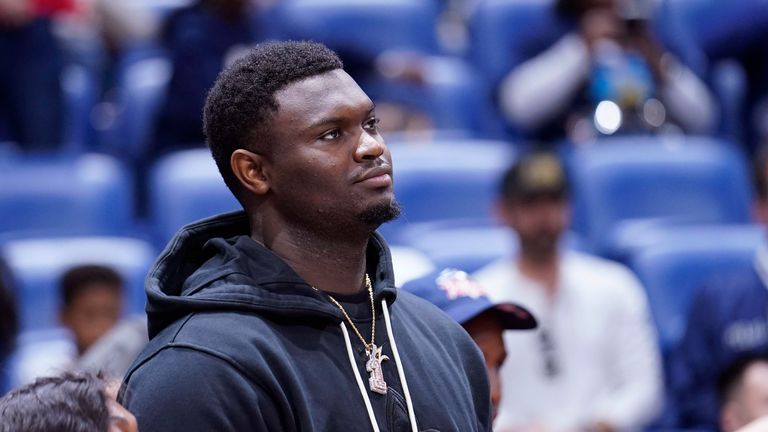 New Orleans Pelicans forward Zion Williamson watches from the bench 