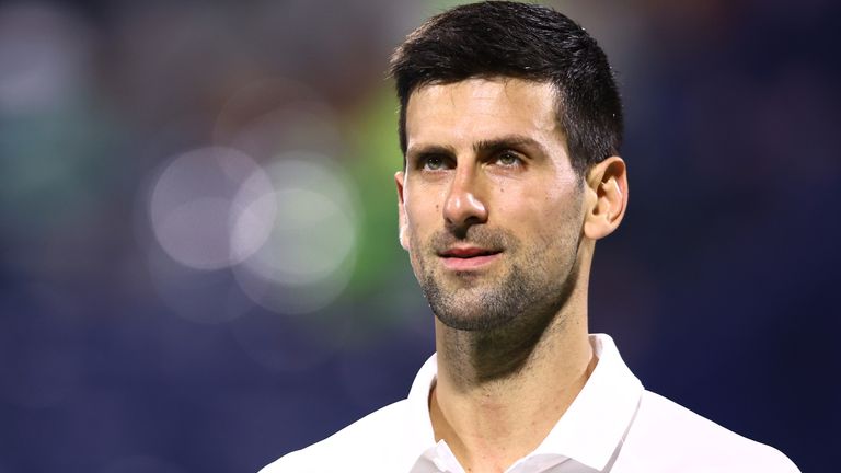 Novak Djokovic of Serbia looks on against Lorenzo Musetti of Italyduring day eight of the Dubai Duty Free Tennis at Dubai Duty Free Tennis Stadium on February 21, 2022 in Dubai, United Arab Emirates. (Photo by Francois Nel/Getty Images)