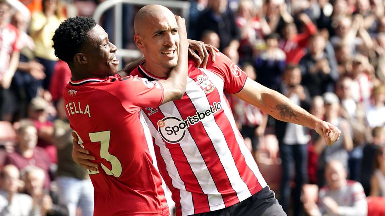 Southampton&#39;s Oriol Romeu (right) celebrates scoring their side&#39;s first goal of the game with team-mate Nathan Tella