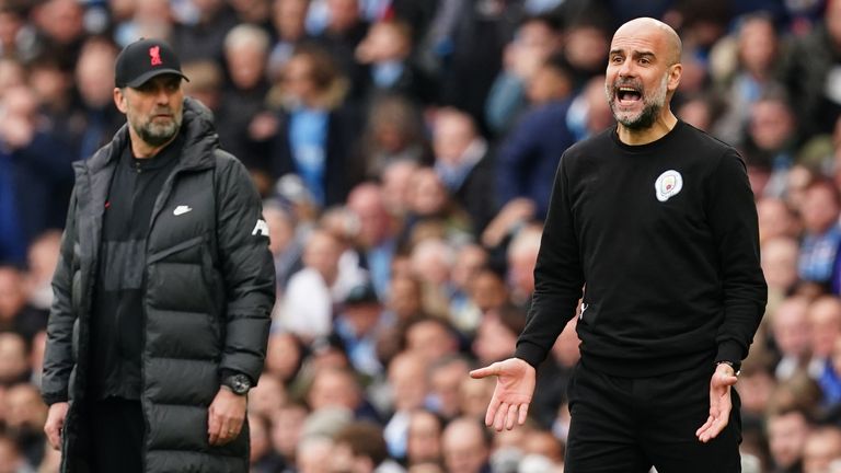 Manchester City manager Pep Guardiola and Liverpool manager Jurgen Klopp on the touchline at the Etihad