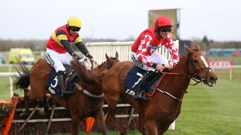 Pied Piped jumps across the path of Knight Salute at Aintree