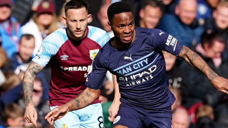 Manchester City's Raheem Sterling (right) evades a tackle from Burnley's Charlie Taylor (left) during the Premier League match at Turf Moor, Burnley. Picture date: Saturday April 2, 2022.