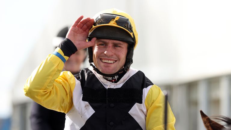 Rob James salutes the crowd after victory in the Scottish National on Win My Wings