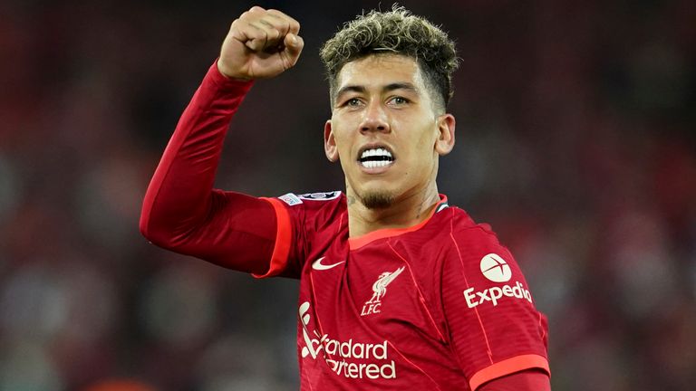 Roberto Firmino scored twice to extend Liverpool's advantage over Benfica