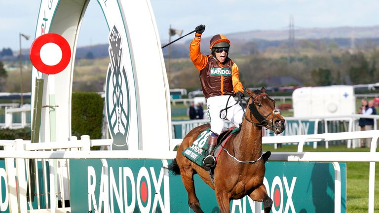 Sam Waley-Cohen celebrates victory in the 2022 Grand National on Noble Yeats