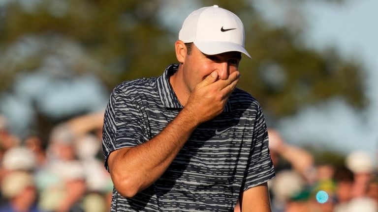 Scottie Scheffler reacts after winning the 86th Masters