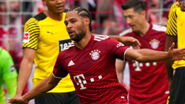 Serge Gnabry wheels away after opening the scoring for Bayern Munich against Borussia Dortmund