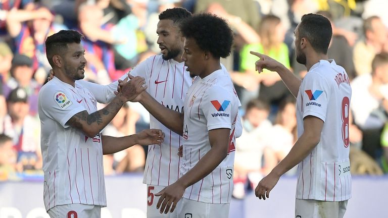 Sevilla stayed level on points in third after a 3-2 win at Levante