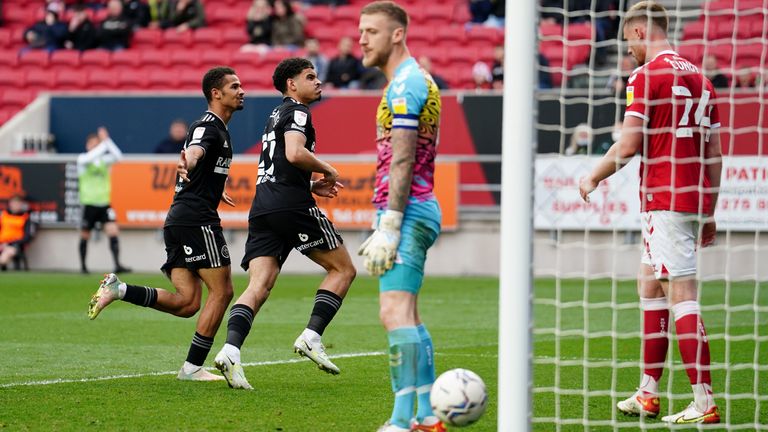 Gibbs-White celebrates his acrobatic equaliser