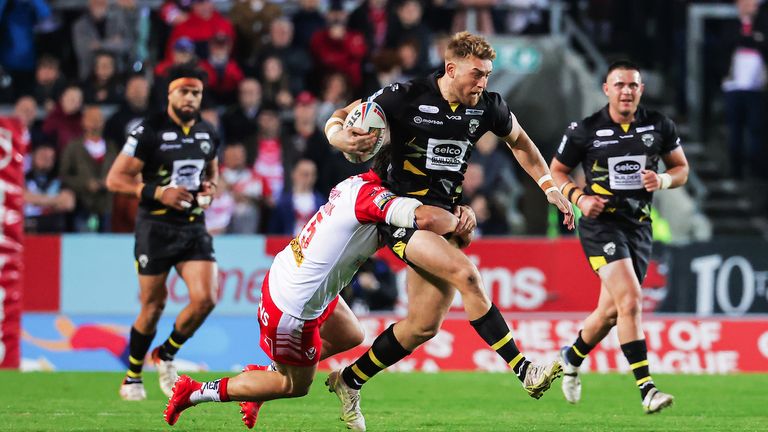 St Helens had to hold on to see off a valiant display from the Red Devils