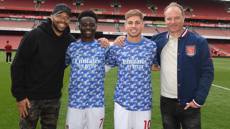 Bukayo Saka and Emile Smith Rowe pictured with Arsenal legends Thierry Henry and Dennis Bergkamp at the Emirates Stadium