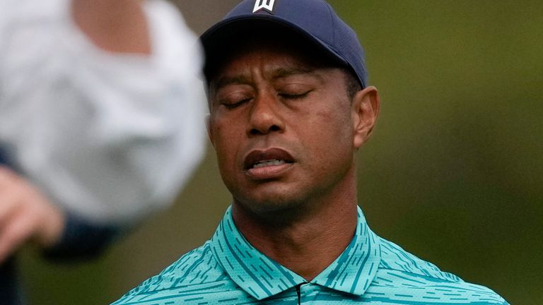 Tiger Woods reacts to his shot on the 12th hole during the second round at the Masters golf tournament on Friday, April 8, 2022, in Augusta, Ga. (AP Photo/Matt Slocum)