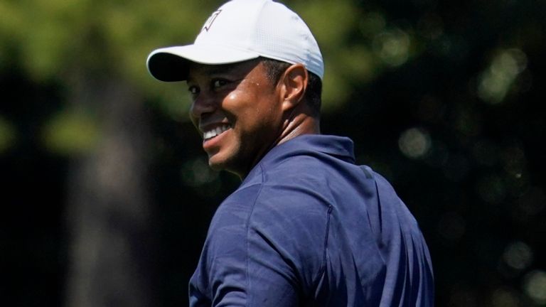 Tiger Woods waits to hit on the driving range during a practice round for the Masters golf tournament on Monday, April 4, 2022, in Augusta, Ga. (AP Photo/Robert F. Bukaty)