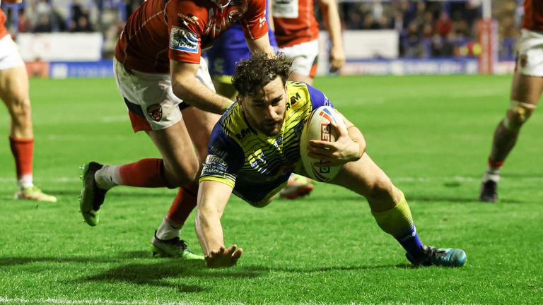 Picture by Paul Currie/SWpix.com - 14/04/2022 - Rugby League - Betfred Super League Round 8 - Warrington Wolves v Salford Red Devils - Halliwell Jones Stadium, Warrington, England - Warrington Wolves' Toby King scoring his hat trick try