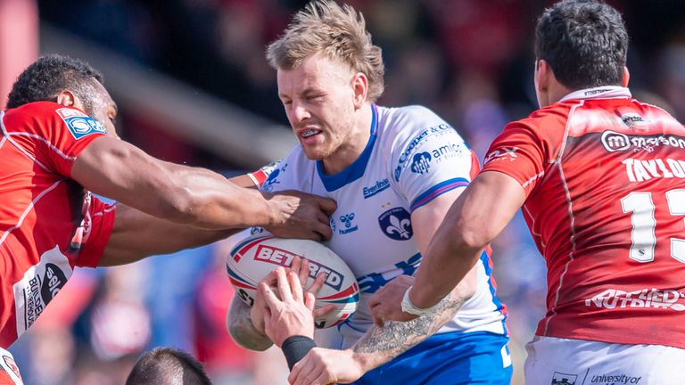 Tom Johnstone scored two tries as Wakefield defeated Salford