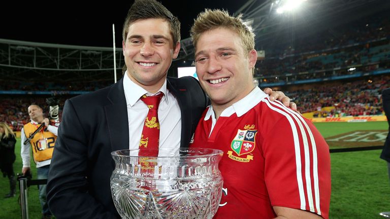 Tom Youngs (right) celebrates the Lions' 2013 series win in Australia with his brother Ben