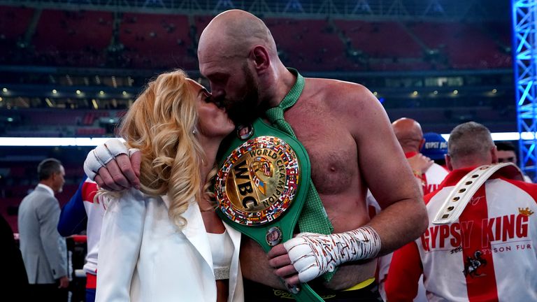 Tyson Fury kisses his wife, Paris, after beating Dillian Whyte