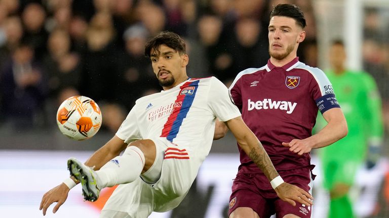 West Ham&#39;s Declan Rice and Lyon&#39;s Lucas Paqueta challenge for the ball 