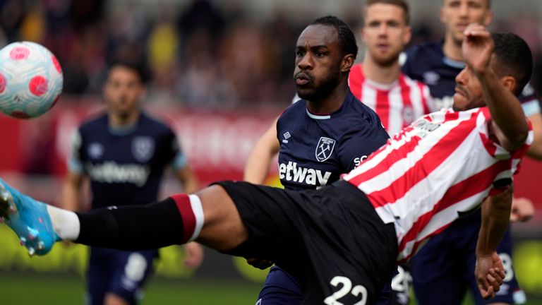 West Ham's Michail Antonio battles for the ball with Brentford's Mathias Jorgensen