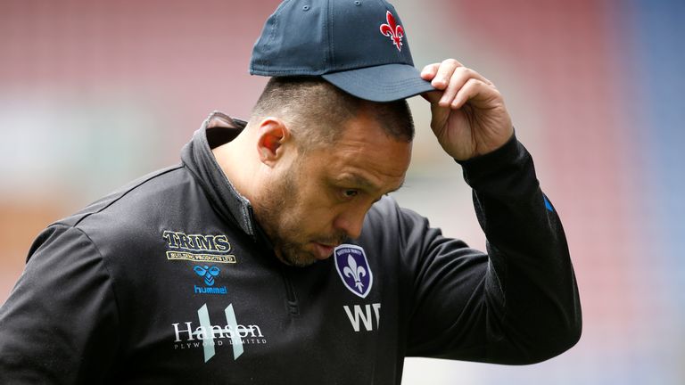 Picture by Ed Sykes/SWpix.com - 18/04/2022 - Rugby League - Betfred Super League Round 9 - Wigan Warriors v Wakefield Trinity - DW Stadium, Wigan, England - Wakefield Trinity head coach Willie Poching leaves the pitch at half time