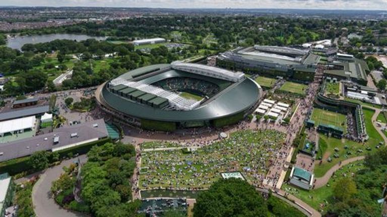 Aerial view across the grounds as spectators watch the big screen on Aorangi Terrace outside court 1 on day seven of Wimbledon at The All England Lawn Tennis and Croquet Club, Wimbledon. Picture date: Monday July 5, 2021.