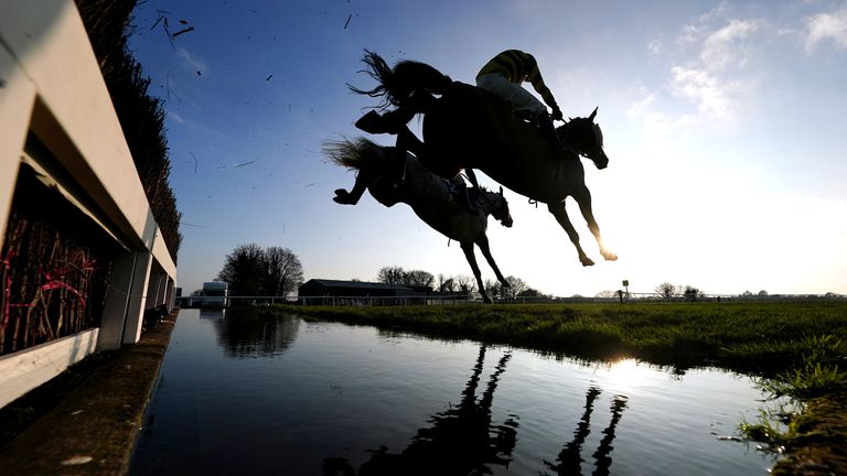Runners clear the water jump at Wincanton