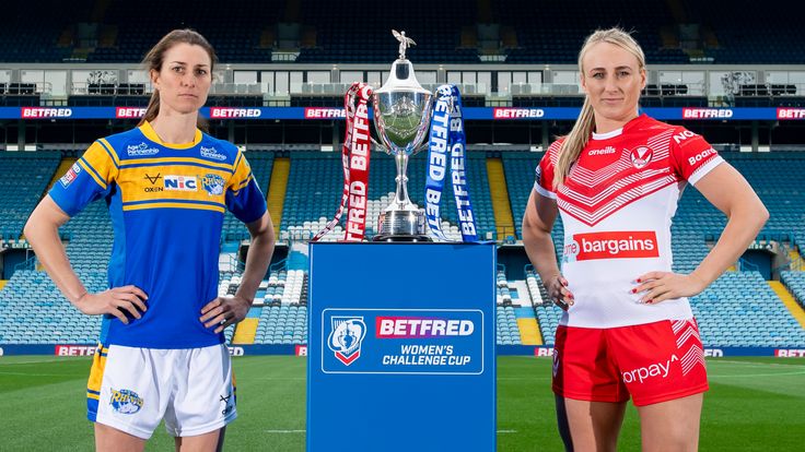 Picture by Allan McKenzie/SWpix.com - 03/05/2022 - Rugby League - Betfred Challenge Cup Semi Final Triple Header Preview - Elland Road, Leeds, England - Leeds Rhinos women's Courtney Winfield-Hill & St Helens women's Jodie Cunningham with the Betfred Women's Challenge Cup.
