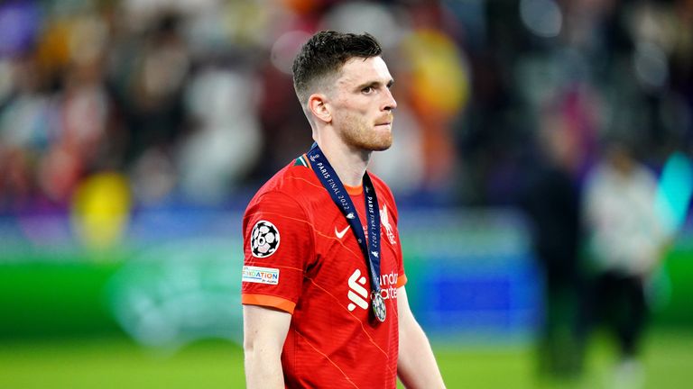 Liverpool's Andrew Robertson looks dejected after collecting his runners-up medal after defeat to Real Madrid in the UEFA Champions League Final at the Stade de France, Paris. Picture date: Saturday May 28, 2022.