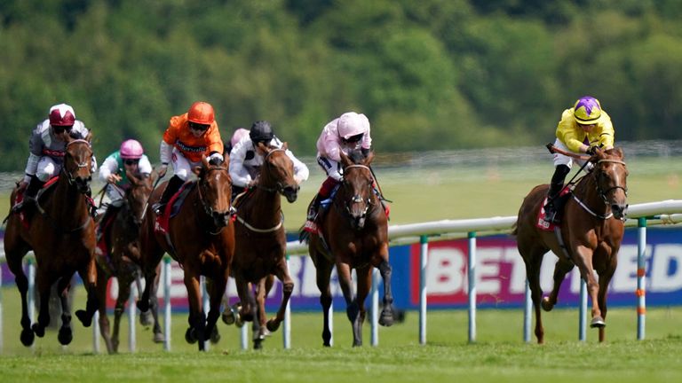 Sea La Rosa (right) bursts to the front at Haydock