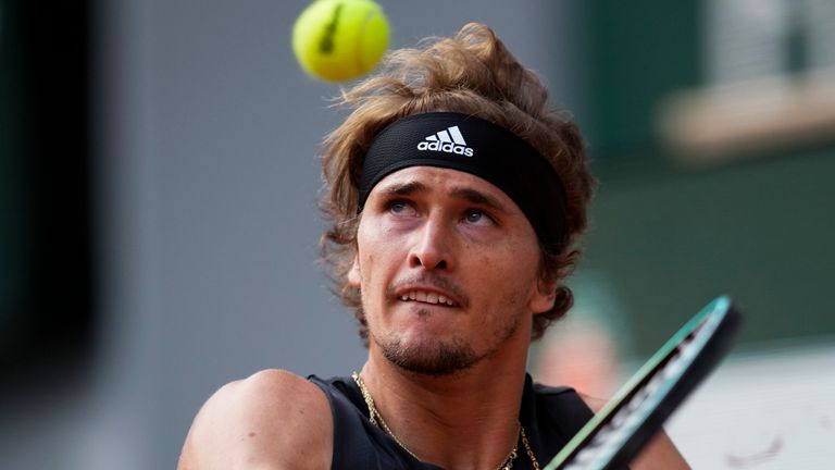 Germany&#39;s Alexander Zverev plays a shot against Spain&#39;s Carlos Alcaraz during their quarterfinal match at the French Open tennis tournament in Roland Garros stadium in Paris, France, Tuesday, May 31, 2022. (AP Photo/Christophe Ena)