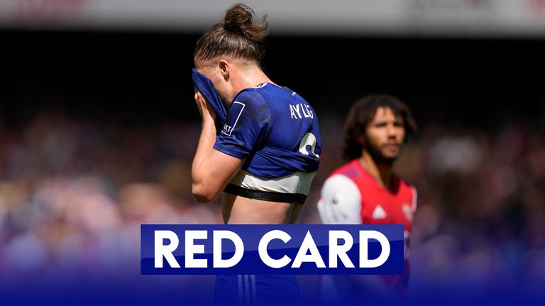 Leeds' Ayling walks off after receiving a red card against Arsenal