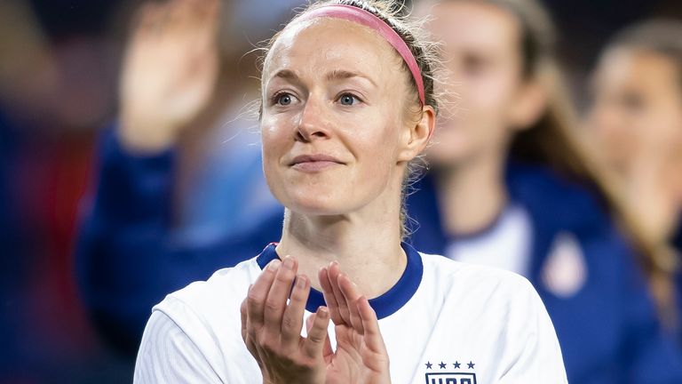 KANSAS CITY, KS - OCTOBER 21: United States defender Becky Sauerbrunn (4) shows appreciation to the fans in attendance following the international friendly match between the USWNT and South Korea on Thursday October 21, 2021 at Children's Mercy Park in Kansas City, KS. (Photo by Nick Tre. Smith/Icon Sportswire) (Icon Sportswire via AP Images)