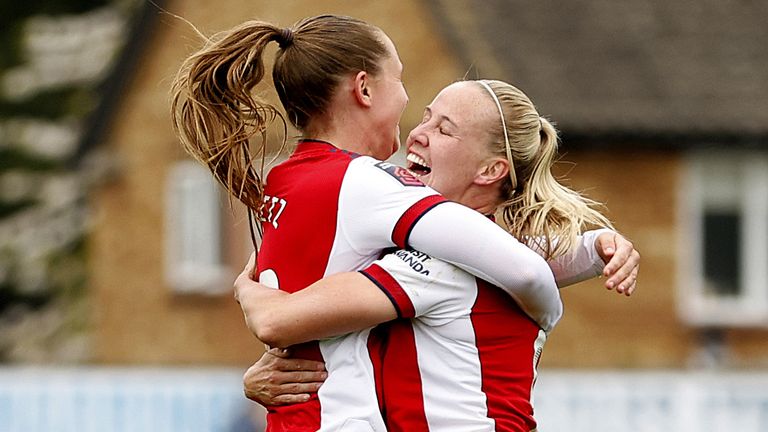 Arsenal's Beth Mead celebrates scoring her side's fourth goal with team-mate Noellle Maritz