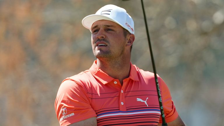 Bryson DeChambeau watches his shot from the sixth tee during the third round of the Dell Technologies Match Play Championship golf tournament, Friday, March 25, 2022, in Austin, Texas. (AP Photo/Tony Gutierrez)