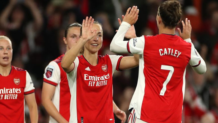 Caitlin Foord (centre) celebrates scoring Arsenal's second against Spurs