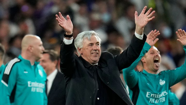 Real Madrid's head coach Carlo Ancelotti greets fans at the end of the Champions League semi final