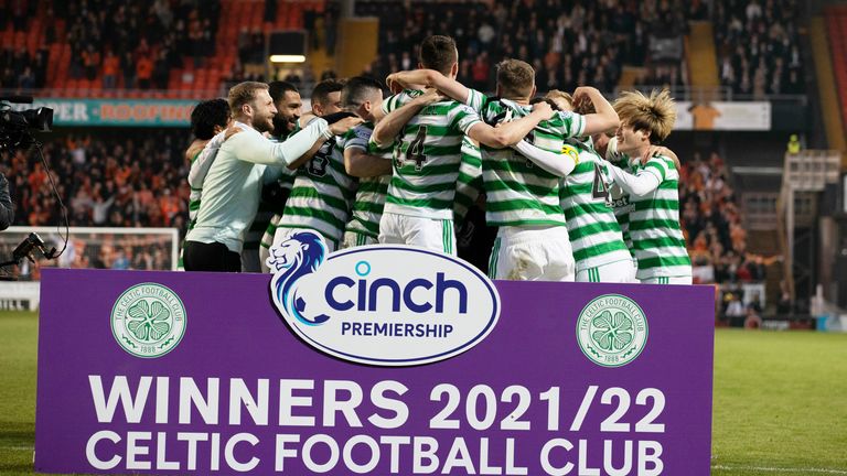 DUNDEE, SCOTLAND - MAY 11: Celtic squad celebrate in front of the winners board during a cinch Premiership match between Dundee Utd and Celtic at Tannadice, on May 11, 2022, in Dundee, Scotland. (Photo by Craig Williamson / SNS Group)